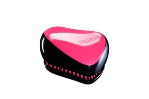 pink and black compact hair brush