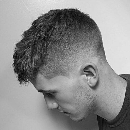 black and white profile of someone with short hair