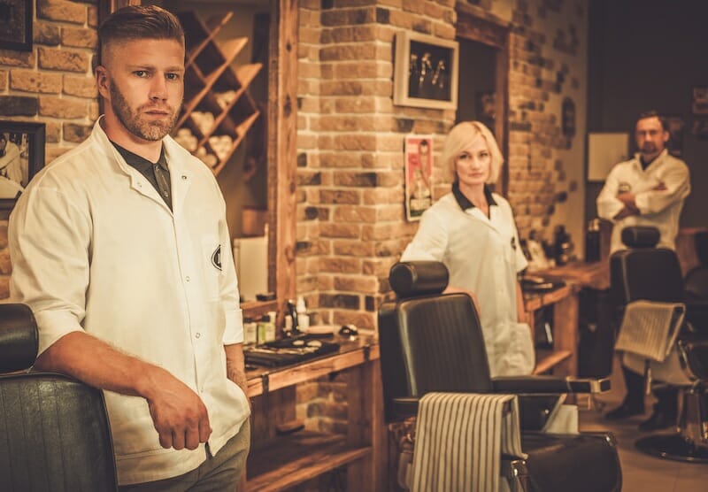 Workers of barber shop on their working places